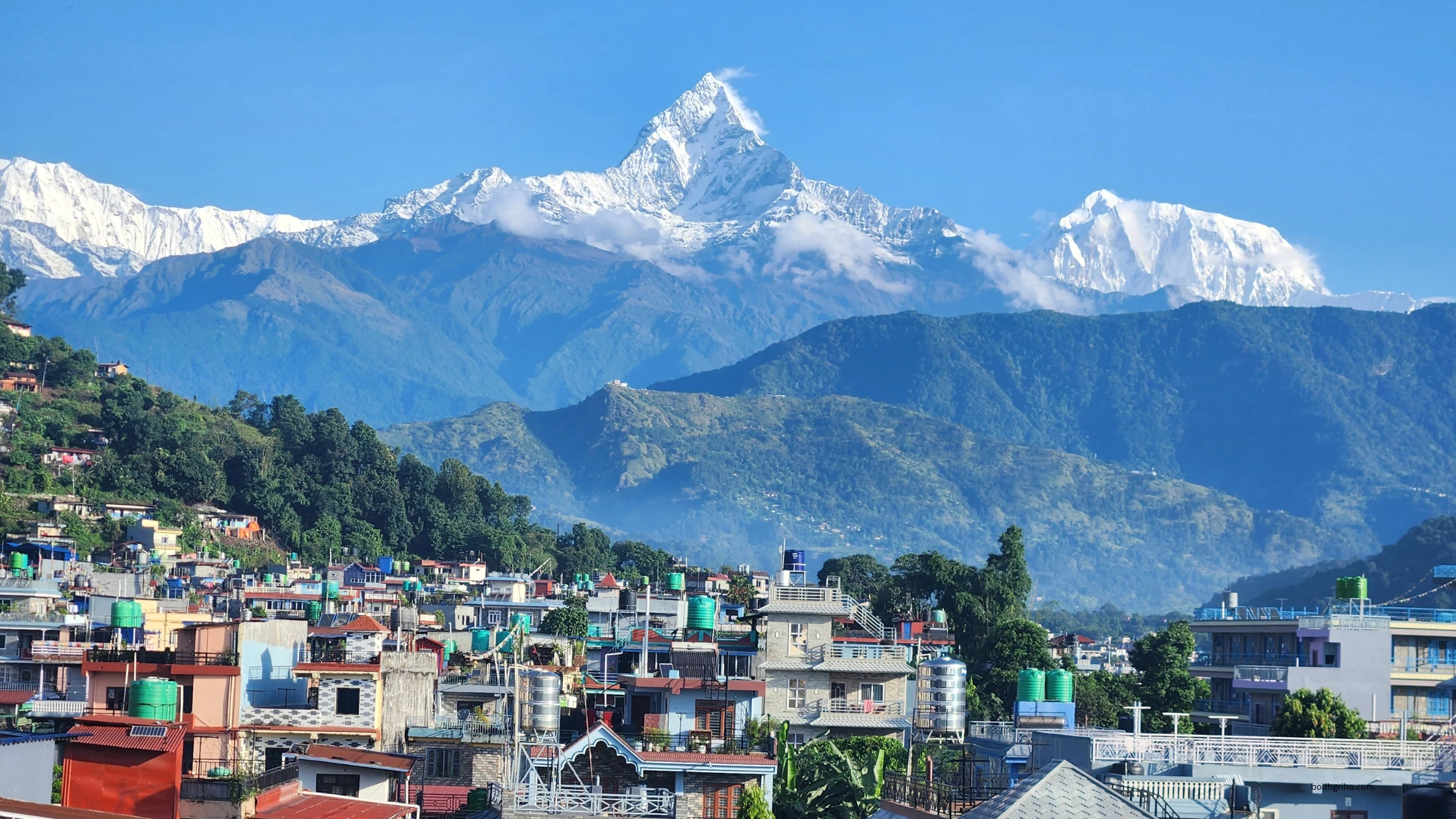 mountains in the distance with a town below and a